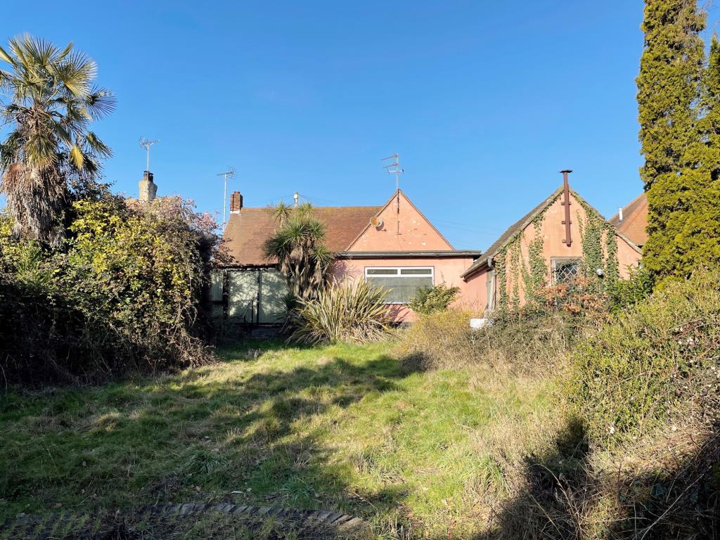 Lot: 9 - DETACHED BUNGALOW FOR IMPROVEMENT - Rear of Property taken from the garden looking back to the bungalow